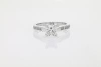 Four Claw Diamond Ring with Channel Set Diamonds