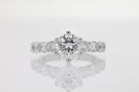 Six Prong Diamond Engagement Ring Featuring Diamonds on Side