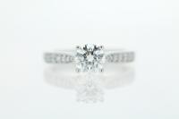 Four Prong Diamond Engagement Ring with Tapered Band