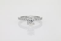 Four Claw Engagement Ring With Diamond Encrusted Under Bezel