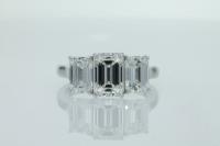 Four Claw Three Stone Diamond Engagement Ring