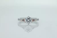 Three Stone Diamond Engagement Ring with Six Claw Centre Setting and Bezel Set Side Stones