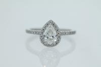 Halo Diamond Engagement Ring with Diamonds Set on Shoulders and Side
